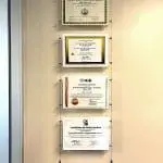 C1039 — Office Certificate Wall Displays Suspended with Tension Cables
