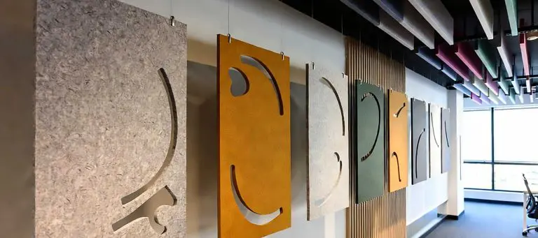 Innovative Acoustic Solutions | How Suspended Panels Can Beautify and Quiet Your Workspace