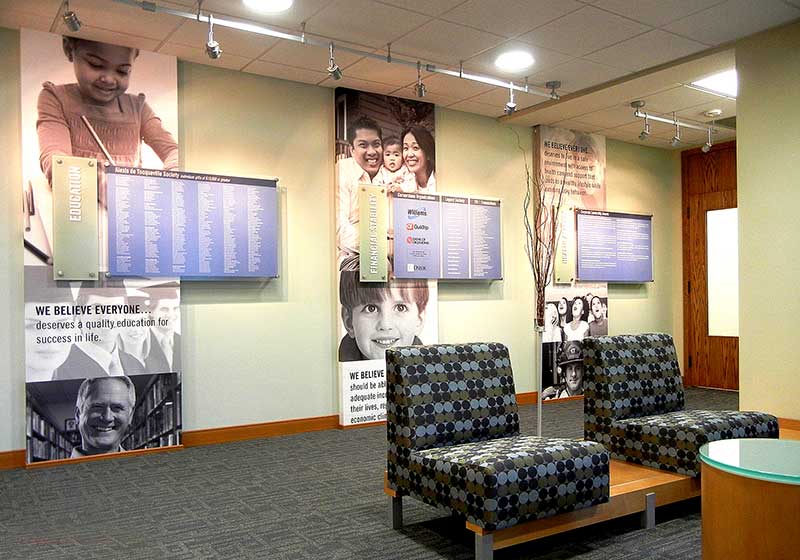 Frameless Acrylic Poster Displays Mounted on Standoffs