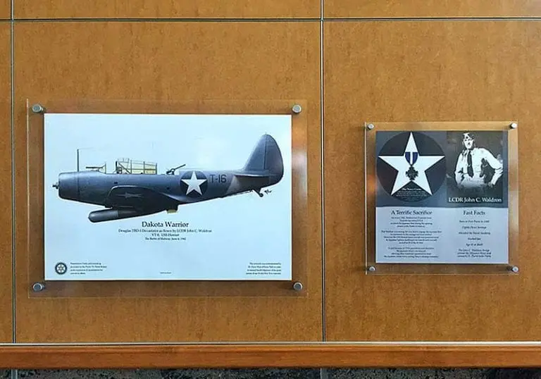 Frameless Acrylic Poster Displays Mounted on Standoffs