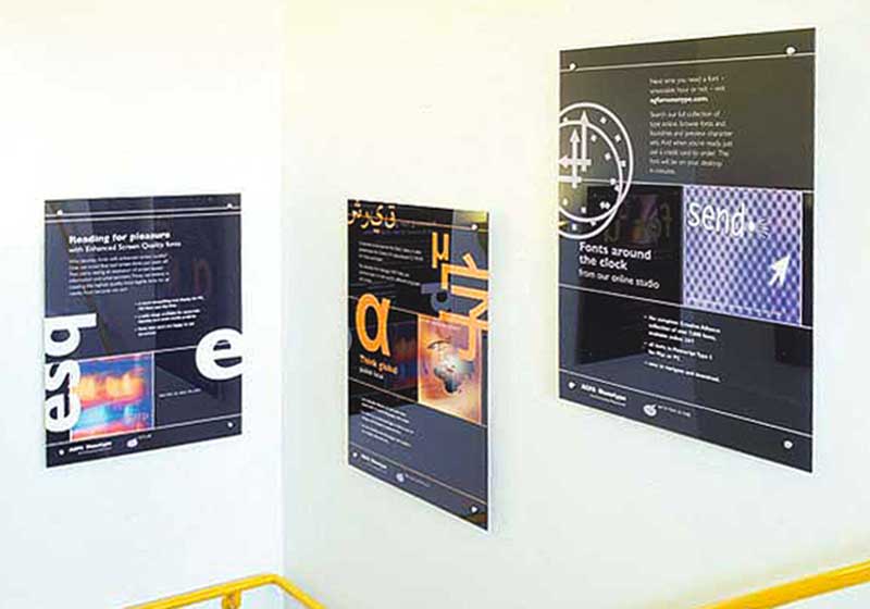 Frameless Acrylic Poster Displays Mounted on Standoffs