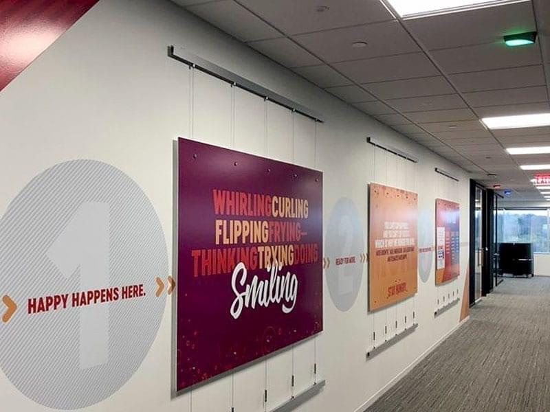 T2029 — Cable Suspended Displays with Wall-to-Wall Mounted Rails