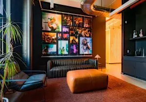 T2043 — Wall Display with Rail Mounted Tension Cables for Soundcloud NYC Office Remodel