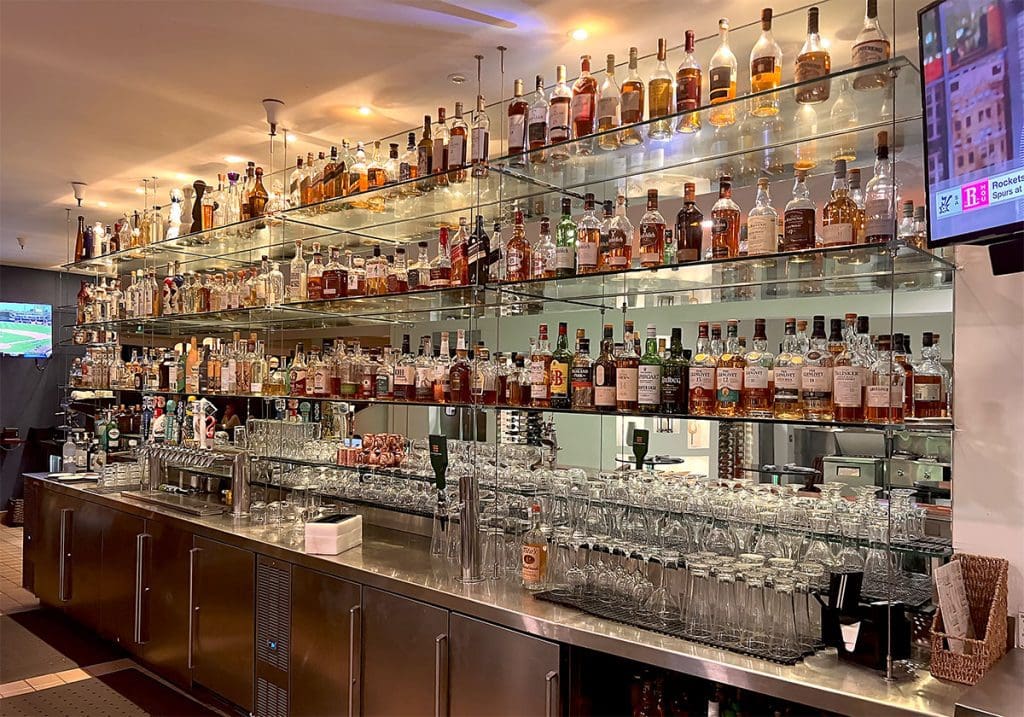 F1004 — Cable Suspended Glass Shelves for Wine and Liquor Display