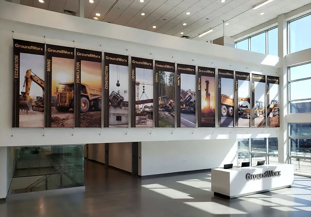H2022 — Corporate Product Wall Display / Graphic Banners Suspended with Cable Systems | Design Concept