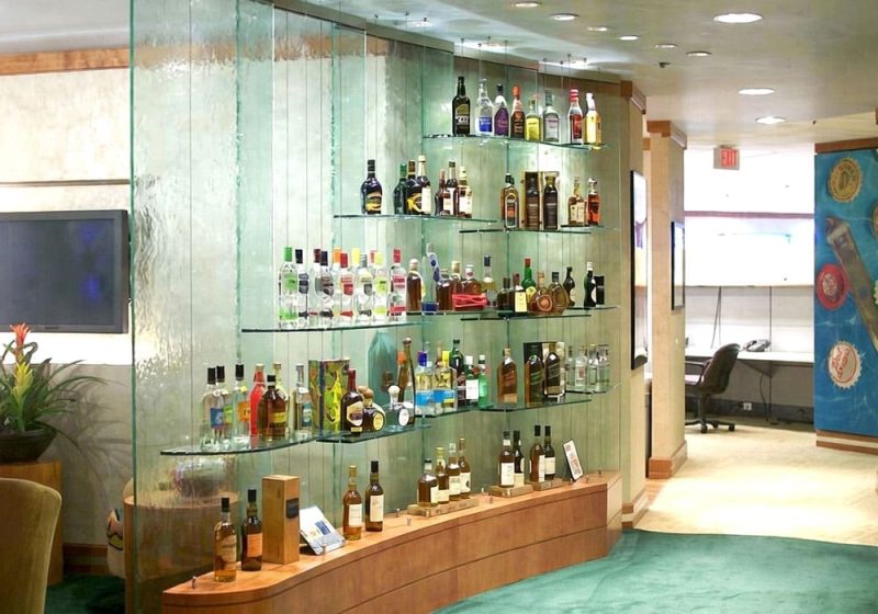 C5016 — Cable Suspended Glass Shelves for Showcasing Wine Collections