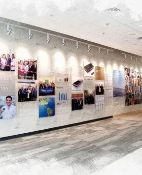DR3001 — Acrylic Framed Employee Photos and Company Info Suspended with Wall-to-Wall Cable System | Design Concept