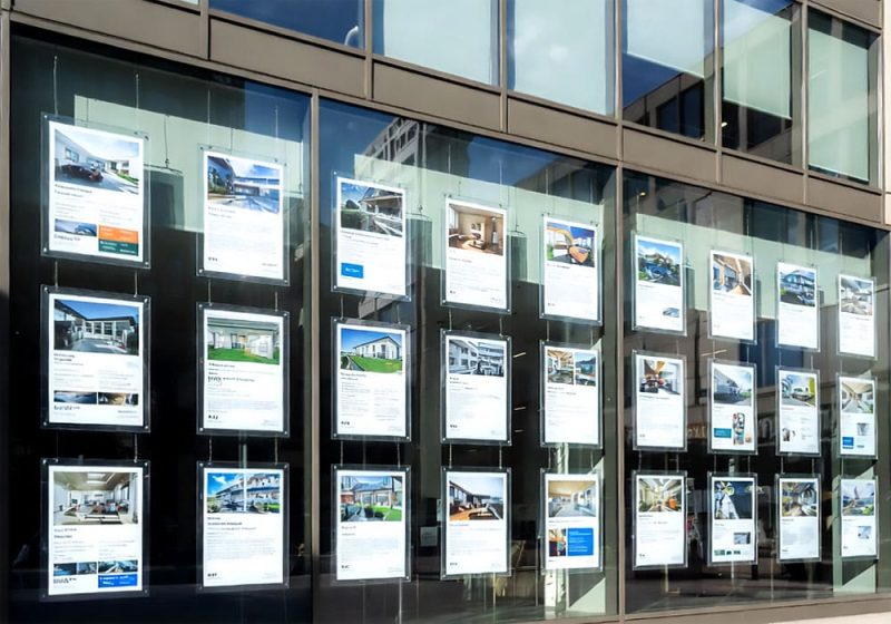 L1028 — Window Display with LED Bright-Lit Acrylic Frames Suspended with Cable Systems