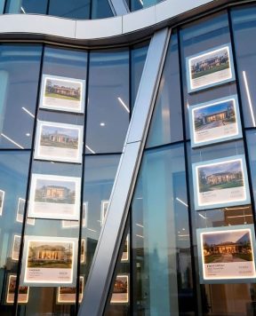 L1029 — Window Display with LED Bright-Lit Acrylic Frames Suspended with Cable Systems L1029 — Window Display with LED Bright-Lit Acrylic Frames Suspended with Cable Systems
