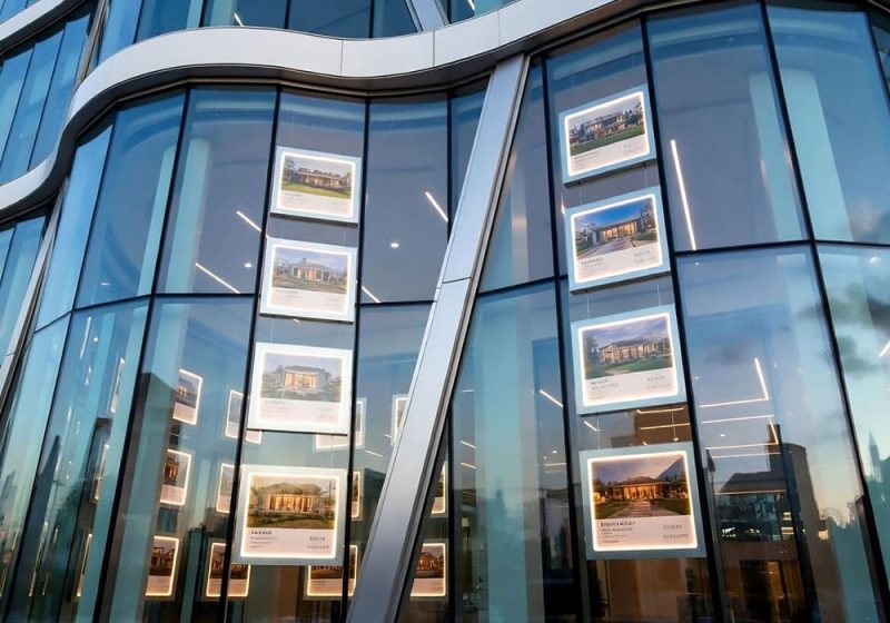 L1029 — Window Display with LED Bright-Lit Acrylic Frames Suspended with Cable Systems