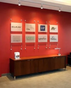 S1027 — Custom Logo Signage Wall-Mounted with Cable Systems | Design Concept