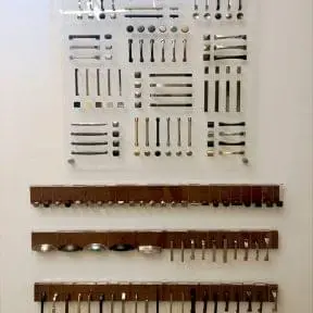 S3101 — Custom Acrylic Display Mounted to Wall with Standoff Supports