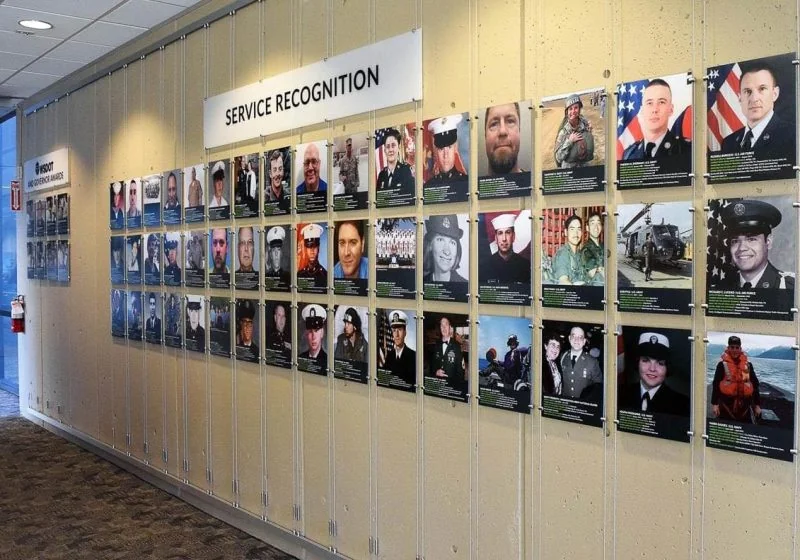 T2017 — Recognition Wall Display with Acrylic Photo Frames / Cable Suspended from Wall Tracks